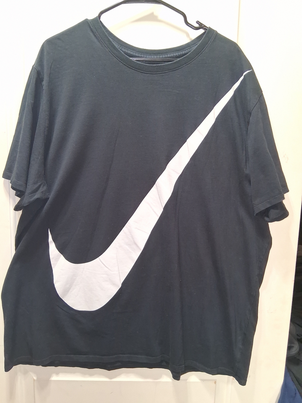 Nike Men’s Black T-Shirt with Large White Swoosh